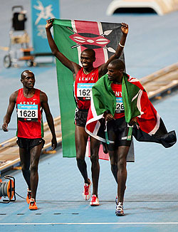 Cosmas Rono, Alex Kipchirchir and John Litei celebrate another Kenyan success