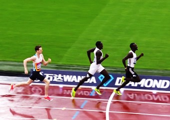 Emmanuel Wanyonyi goes past Marco Arop