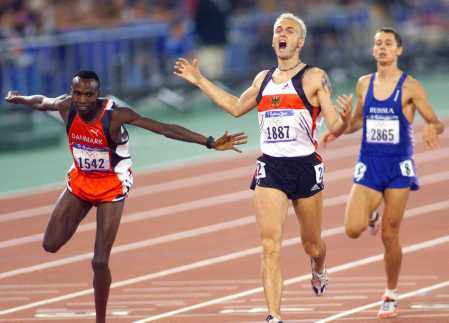 Schumann wins Olympic gold
